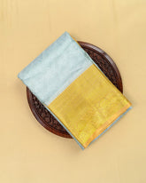 SC4799 - TISSUE SAREE WITH EMBOSE FLOWER DESIGN AND GOLD BORDER